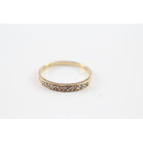 240 - 9ct gold diamond channel set dress ring (1.2g) Size O