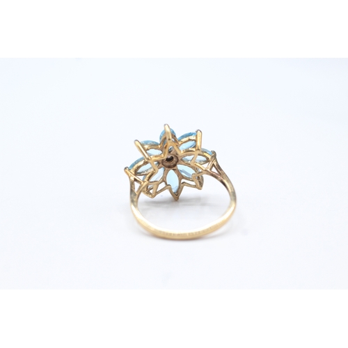 241 - 9ct gold diamond & blue gemstone flower ring (3.1g) Size P