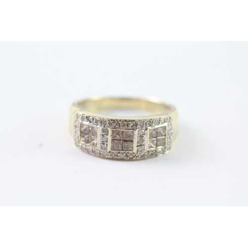 243 - 9ct gold ring with white and champagne diamonds (4.3g) Size P