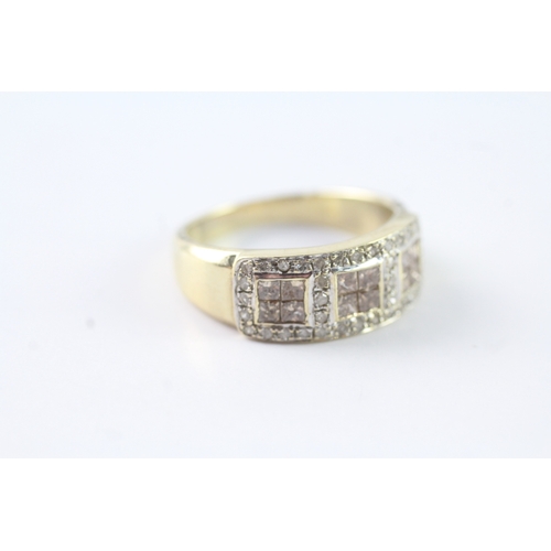 243 - 9ct gold ring with white and champagne diamonds (4.3g) Size P