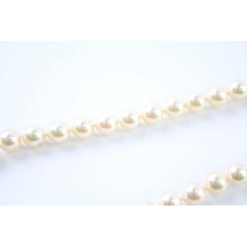 246 - 18ct gold cultured pearl and green gemstone necklace (32.7g)