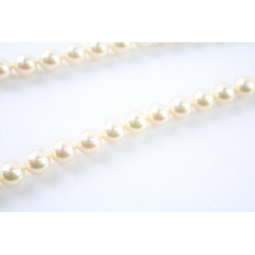 246 - 18ct gold cultured pearl and green gemstone necklace (32.7g)