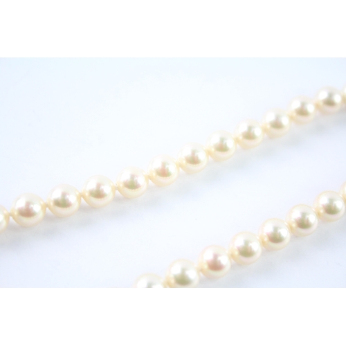 246 - 18ct gold cultured pearl and green gemstone necklace (32.7g)