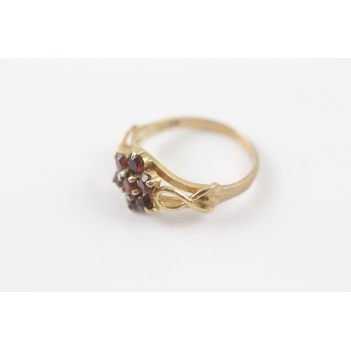 29 - 9ct gold garnet cluster ring with decorative shoulder detail (2.2g) Size L 1/2