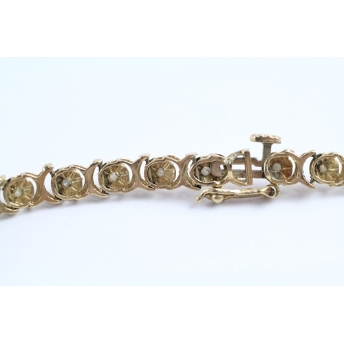 40 - 9ct gold diamond bracelet (5.5g)