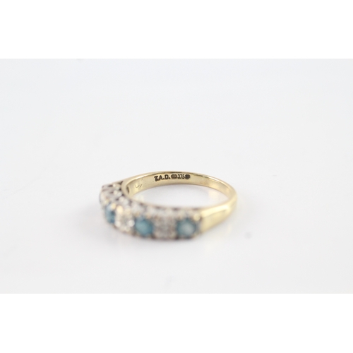 44 - 9ct gold blue gemstone & diamond half eternity ring (2.1g) Size I