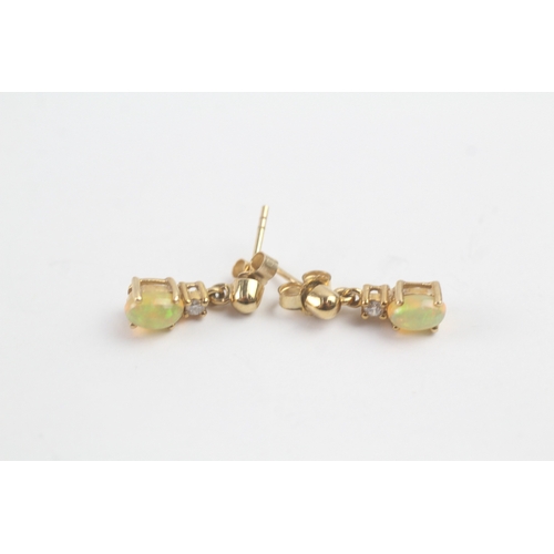 49 - 9ct gold opal & diamond drop earrings (1.5g)