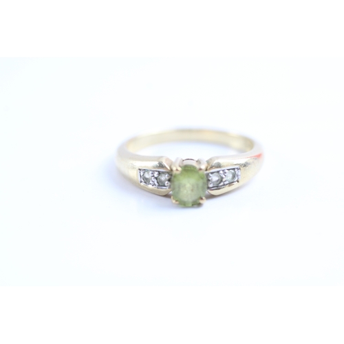 57 - 9ct gold peridot & diamond dress ring (2.8g) Size N