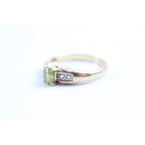 57 - 9ct gold peridot & diamond dress ring (2.8g) Size N