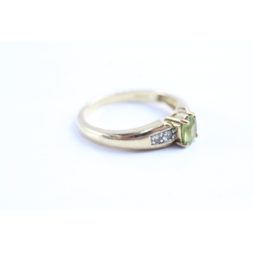 57 - 9ct gold peridot & diamond dress ring (2.8g) Size N