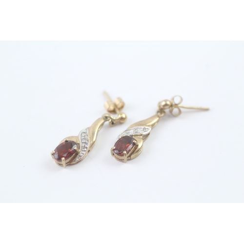 69 - 9ct gold garnet & diamond drop earrings (1.6g)