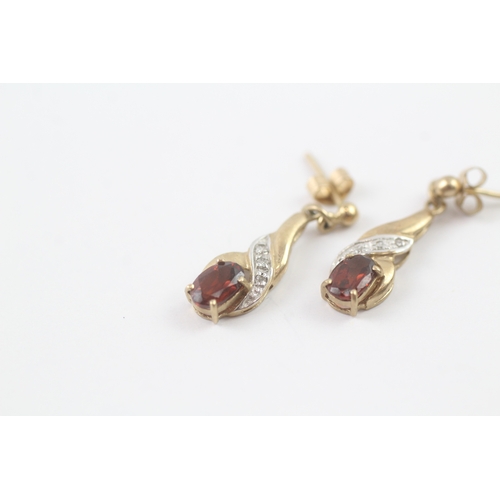 69 - 9ct gold garnet & diamond drop earrings (1.6g)