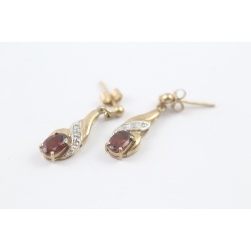 69 - 9ct gold garnet & diamond drop earrings (1.6g)