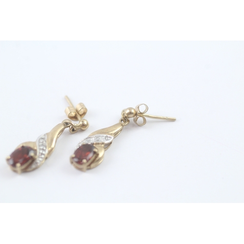 69 - 9ct gold garnet & diamond drop earrings (1.6g)