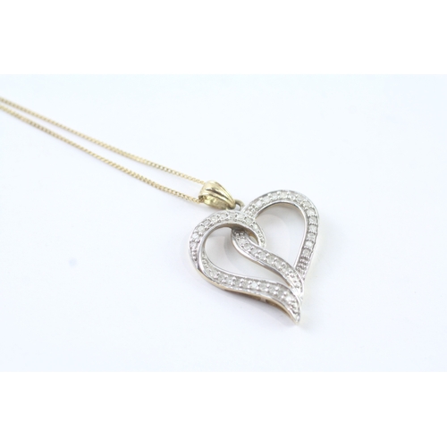 80 - 9ct gold diamond heart pendant on chain (2.6g) Size J