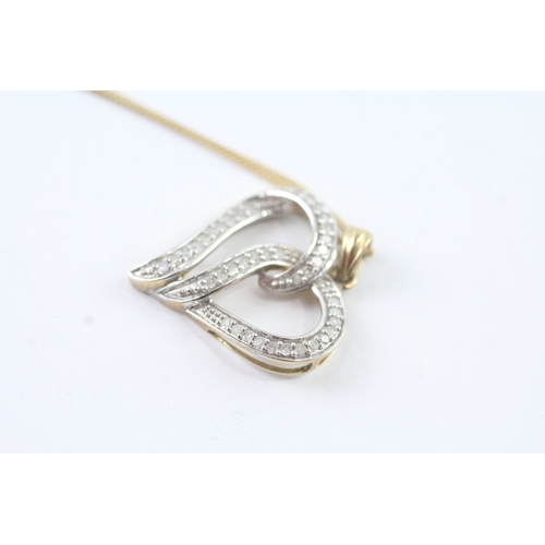 80 - 9ct gold diamond heart pendant on chain (2.6g) Size J