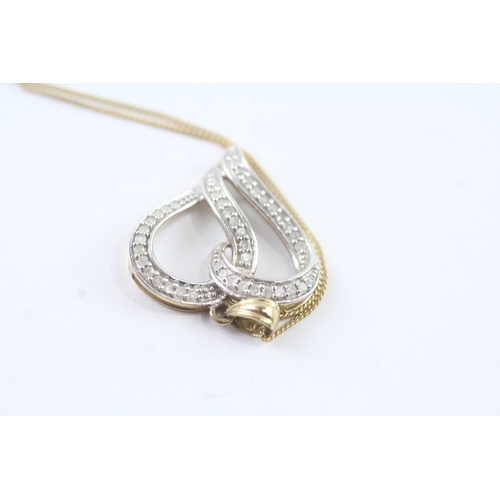 80 - 9ct gold diamond heart pendant on chain (2.6g) Size J