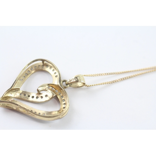 80 - 9ct gold diamond heart pendant on chain (2.6g) Size J