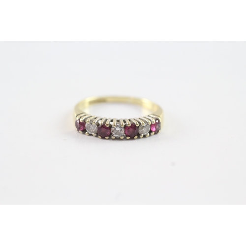 82 - 18ct gold ruby & diamond half eternity ring (2.3g) Size L