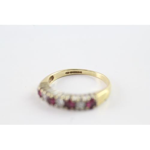 82 - 18ct gold ruby & diamond half eternity ring (2.3g) Size L