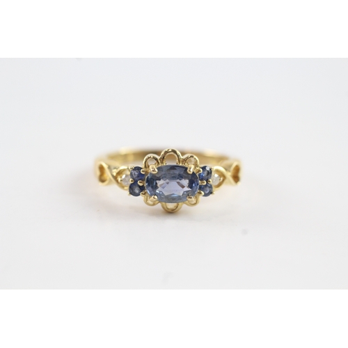 85 - 9ct gold sapphire & diamond dress ring with pierced patterned shoulders (2.9g) Size N 1/2