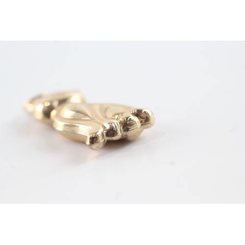 88 - 9ct gold cat pendant (1.6g)