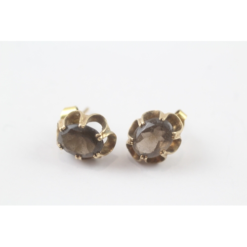 91 - 9ct gold vintage oval cut smokey quartz stud earrings (2.4g)