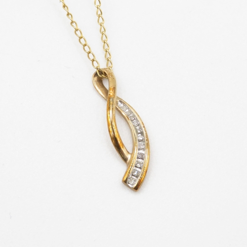 75 - 9ct gold diamond graceful twist pendant necklace (2g)