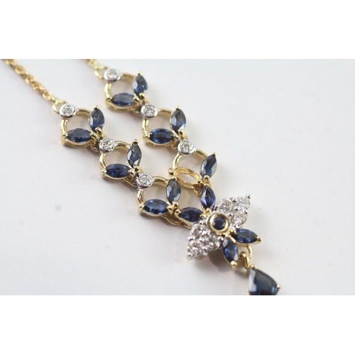 108 - 18ct gold diamond & sapphire floral necklace (6.9g) Size I