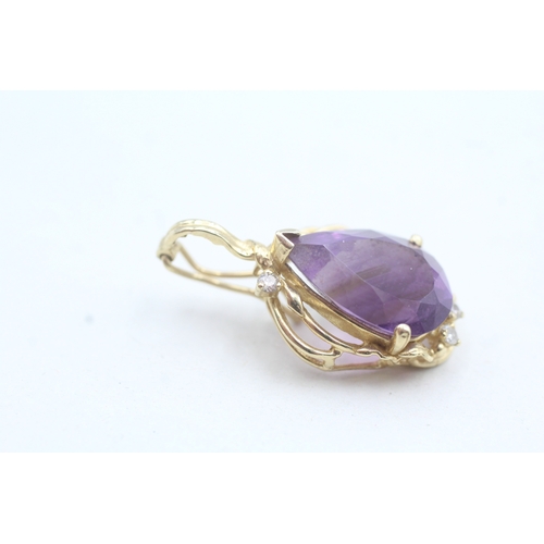 112 - 14ct gold amethyst pendant (3.2g)