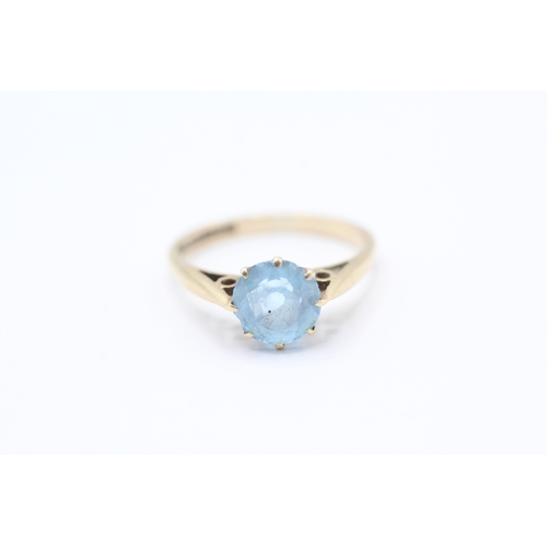 114 - 9ct gold blue gemstone solitaire dress ring (1.7g) Size L 1/2