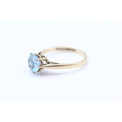 114 - 9ct gold blue gemstone solitaire dress ring (1.7g) Size L 1/2