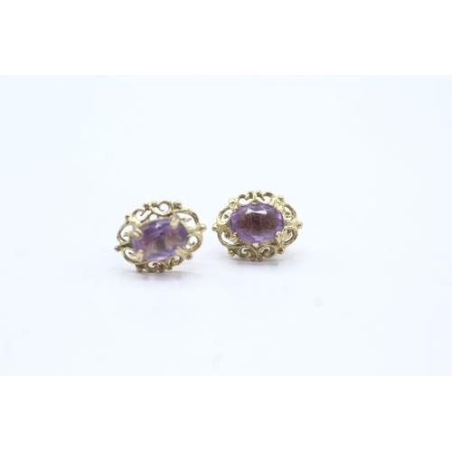 16 - 9ct gold amethyst stud earrings (1.8g)