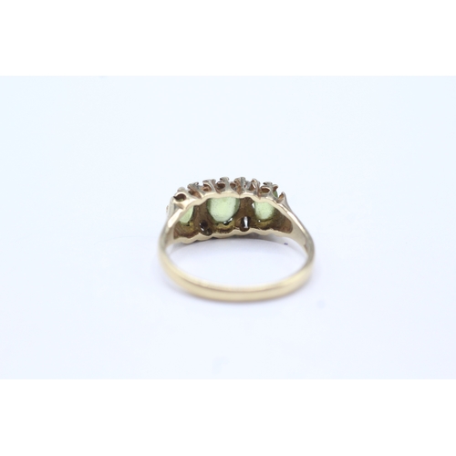 21 - 9ct gold peridot & diamond dress ring (2.5g) Size L 1/2