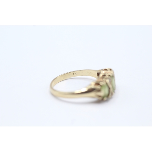 21 - 9ct gold peridot & diamond dress ring (2.5g) Size L 1/2