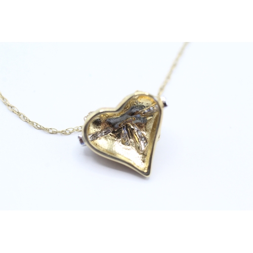 26 - 9ct gold diamond heart shape bow pendant necklace (2.6g)