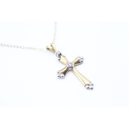 33 - 9ct gold diamond cross pendant necklace (1.7g)