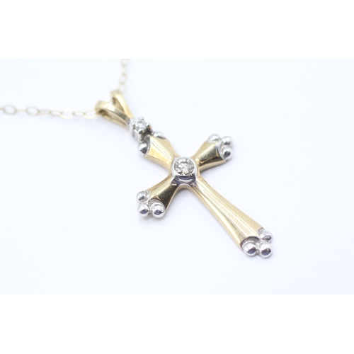 33 - 9ct gold diamond cross pendant necklace (1.7g)