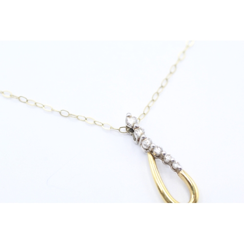 46 - 9ct gold diamond tear drop pendant necklace (1.1g)