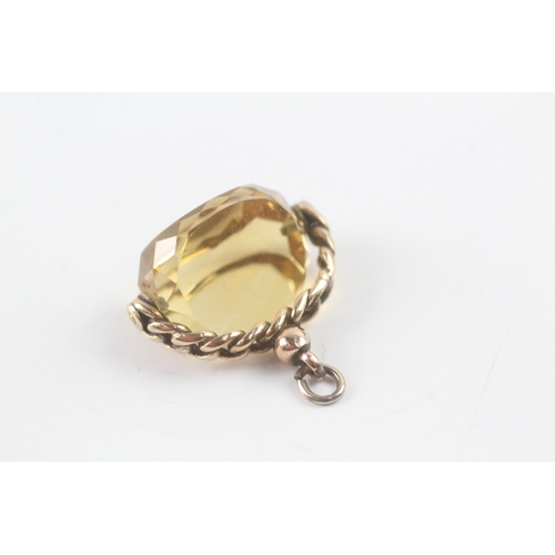 51 - 9ct gold citrine spinner fob (7.8g)