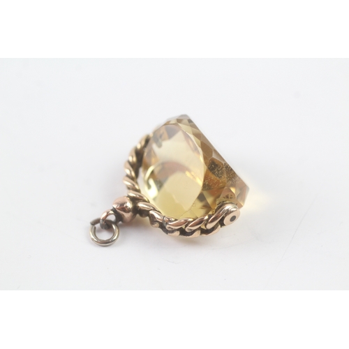 51 - 9ct gold citrine spinner fob (7.8g)