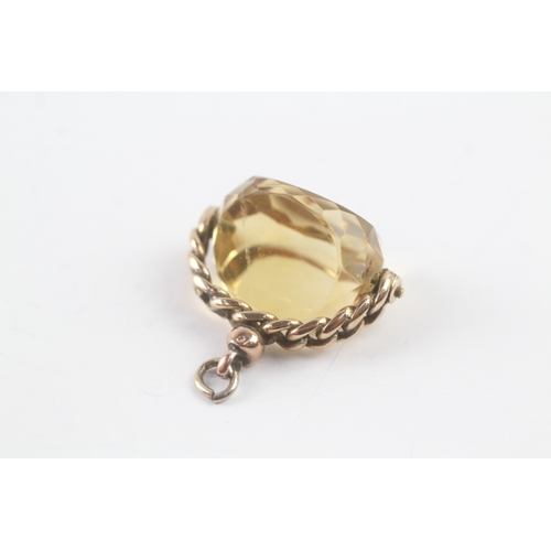 51 - 9ct gold citrine spinner fob (7.8g)