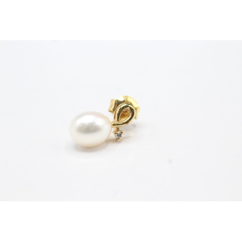 54 - 9ct gold diamond & pearl drop earrings (2.3g)