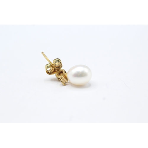 54 - 9ct gold diamond & pearl drop earrings (2.3g)