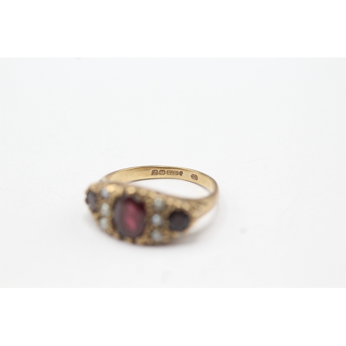 71 - 9ct gold seed pearl & garnet boat ring (3.1g) Size I 1/2