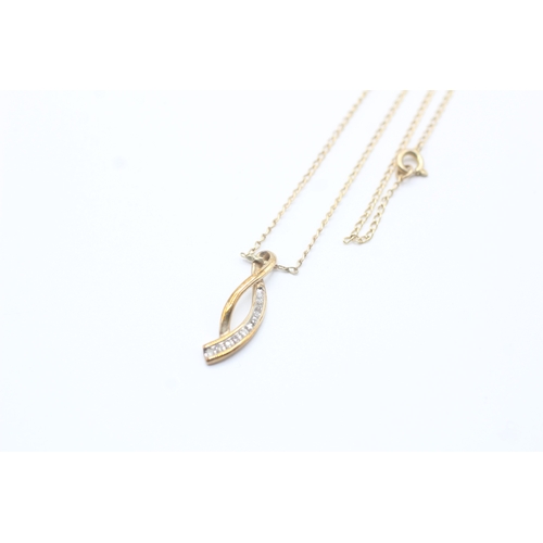 75 - 9ct gold diamond graceful twist pendant necklace (2g)