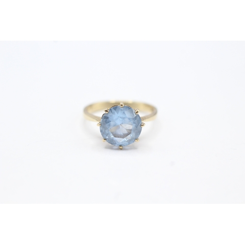 79 - 9ct gold blue gemstone solitaire ring (2.9g)