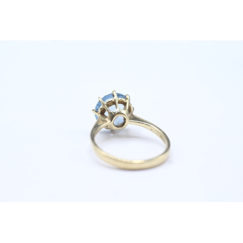 79 - 9ct gold blue gemstone solitaire ring (2.9g)