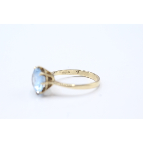 79 - 9ct gold blue gemstone solitaire ring (2.9g)