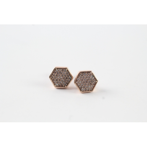 83 - 9ct rose gold diamond stud earrings (1.4g)